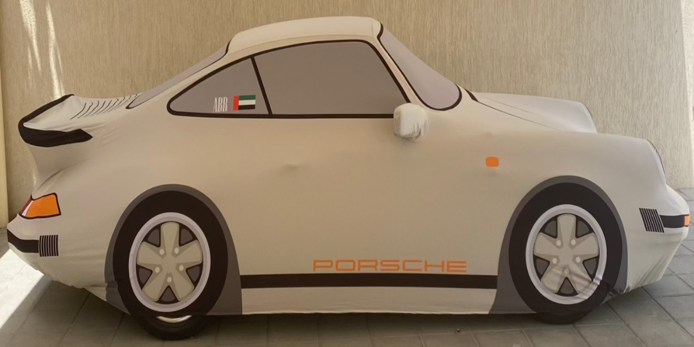 TyreDox bespoke indoor car cover on classic Porsche 911, custom-tailored luxury protection with precision fit and vintage styling for collectors.