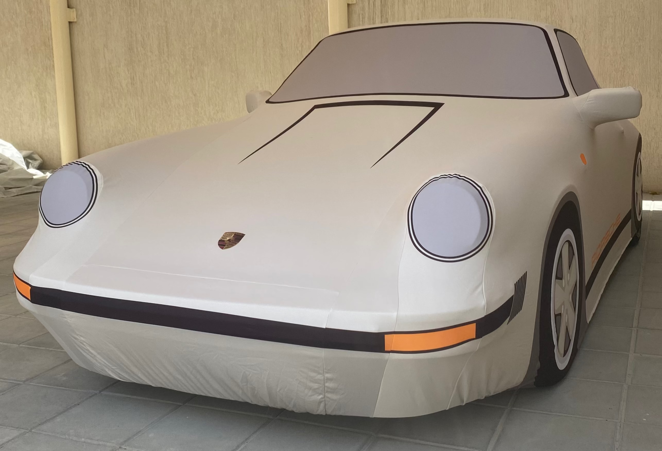 Bespoke TyreDox indoor car cover for classic Porsche 911, custom-tailored premium protection with detailed vintage styling and luxury fit.